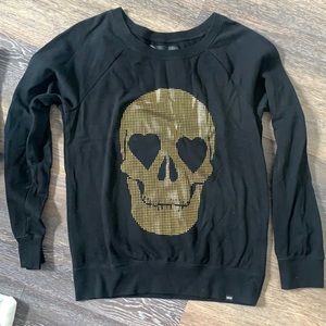 Cans skull black & gold sweatshirt.